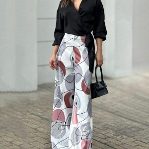 Casual two-piece suit of black tie shirt & printed trousers